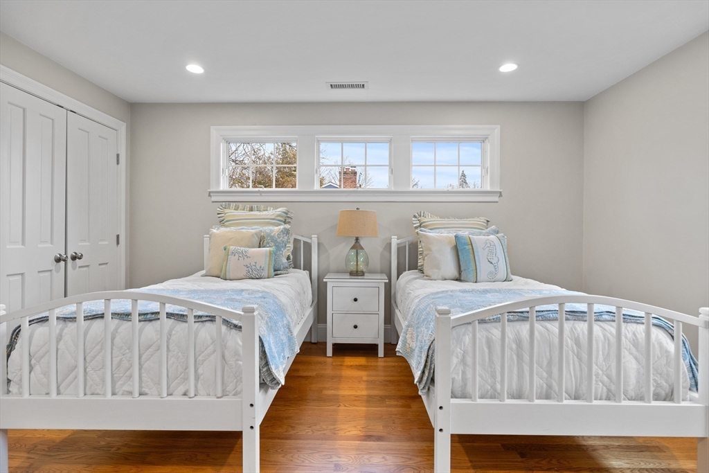 9 Augustus Road Lexington, MA 02421 - Photo 24 of 41 a bedroom with double bed and a window