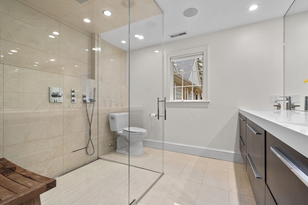 9 Augustus Road Lexington, MA 02421 - Photo 29 of 41 a bathroom with a sink and a mirror