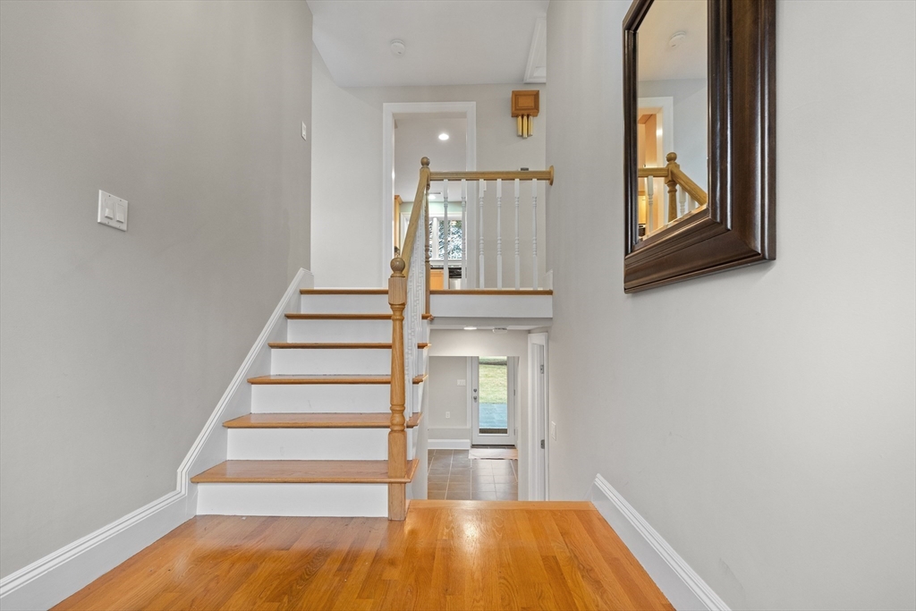 9 Augustus Road Lexington, MA 02421 - Photo 31 of 41 a view of entryway and hall with wooden floor