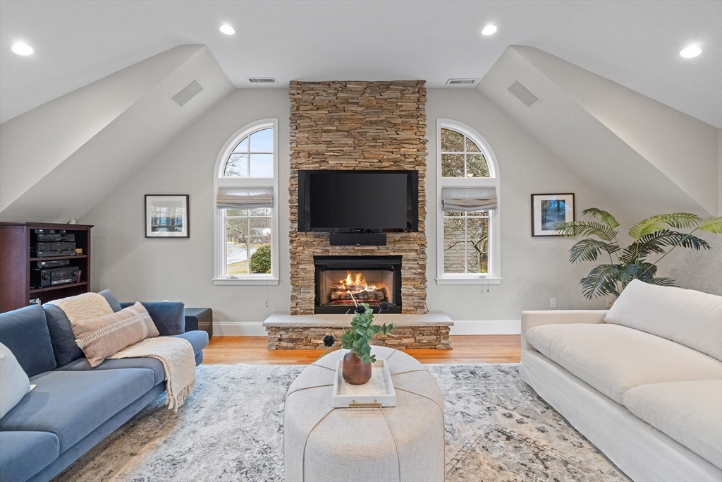 9 Augustus Road Lexington, MA 02421 - Photo 6 of 41 a living room with furniture large window and a fireplace