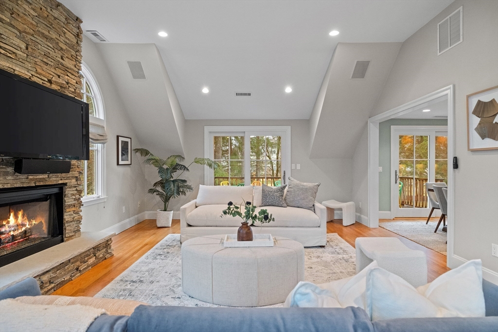 9 Augustus Road Lexington, MA 02421 - Photo 8 of 41 a living room with fireplace furniture and a flat screen tv