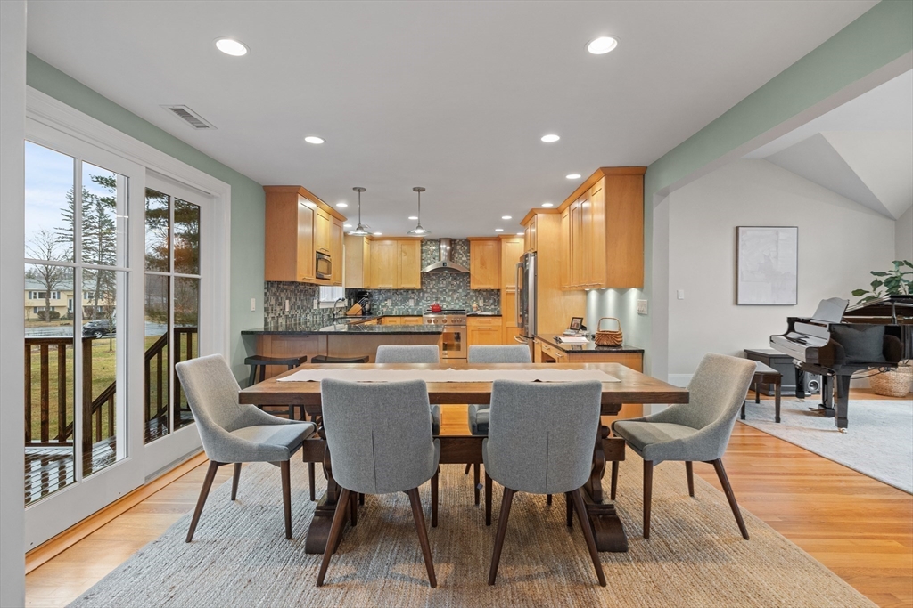 9 Augustus Road Lexington, MA 02421 - Photo 9 of 41 a view of a dining room with furniture window and wooden floor