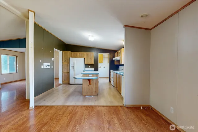 a view of a kitchen and dining room