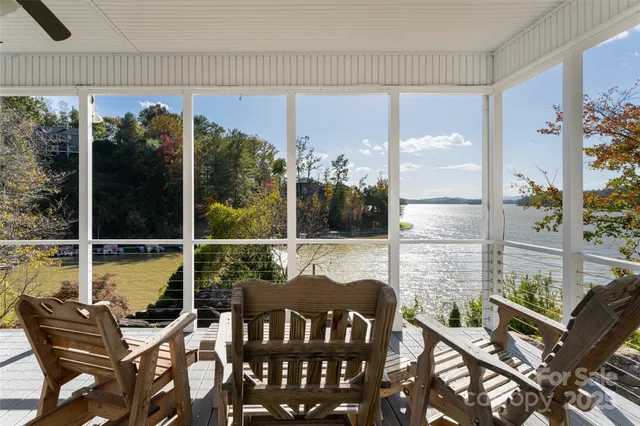 a view of a balcony with chairs