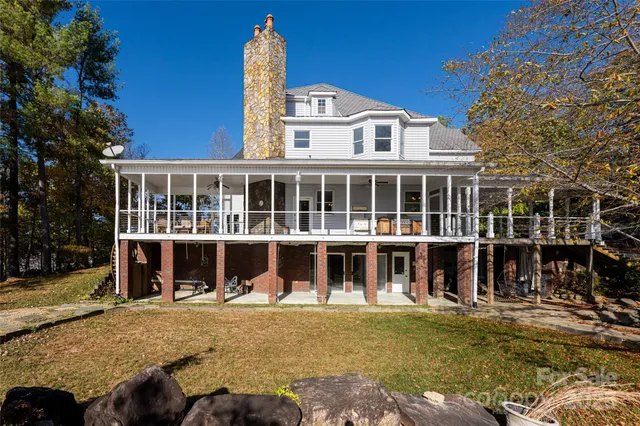 a view of swimming pool with a yard