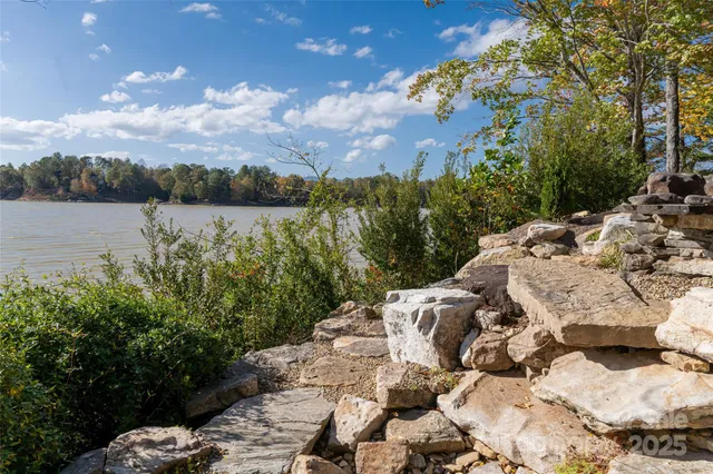 a view of a lake with a house