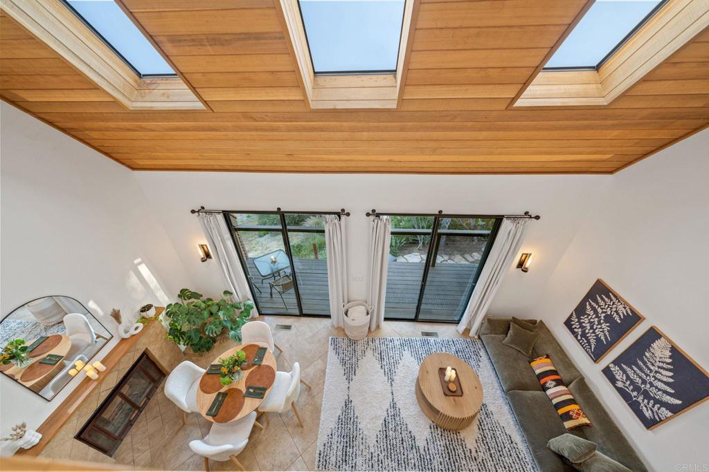 a front view of house with a chairs