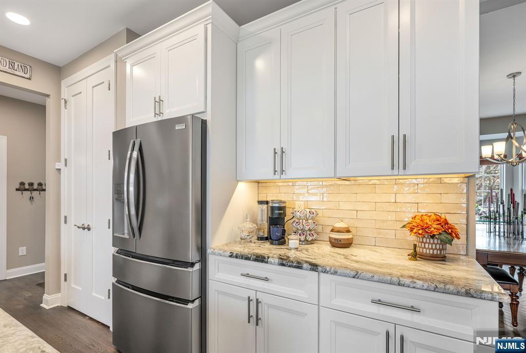 7 Winding Ridge Road Lake Hopatcong, NJ 07849 - Photo 19 of 48 a kitchen with stainless steel appliances granite countertop a refrigerator and a sink