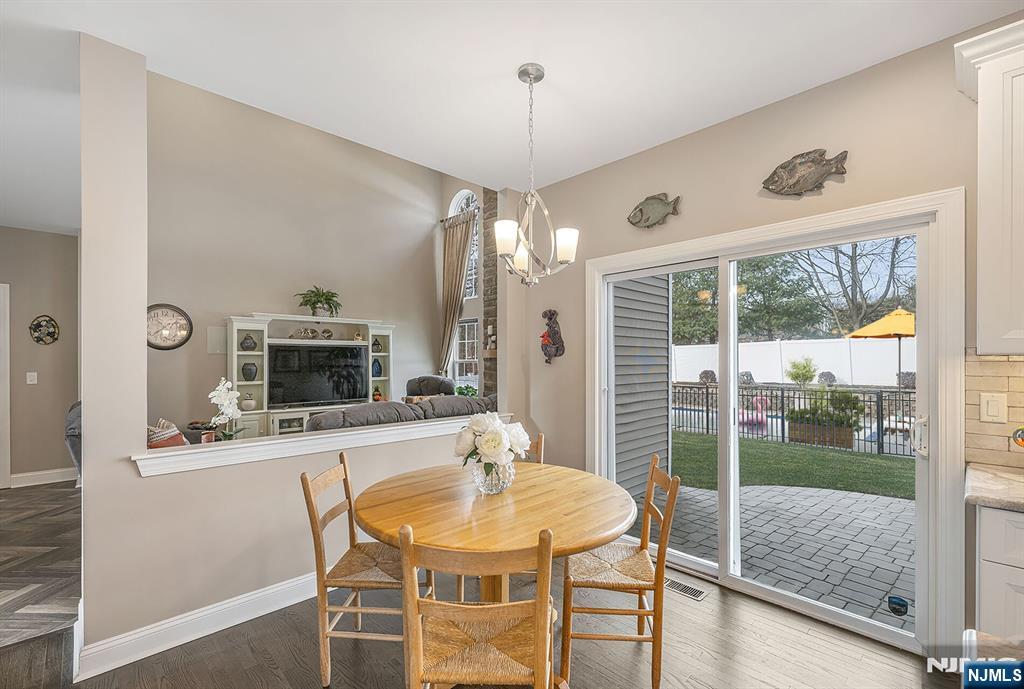 7 Winding Ridge Road Lake Hopatcong, NJ 07849 - Photo 20 of 48 a dining room with furniture a chandelier and window