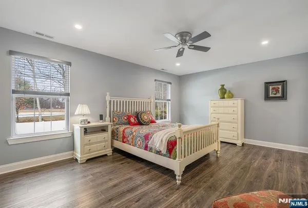 a bed room with a bed and window