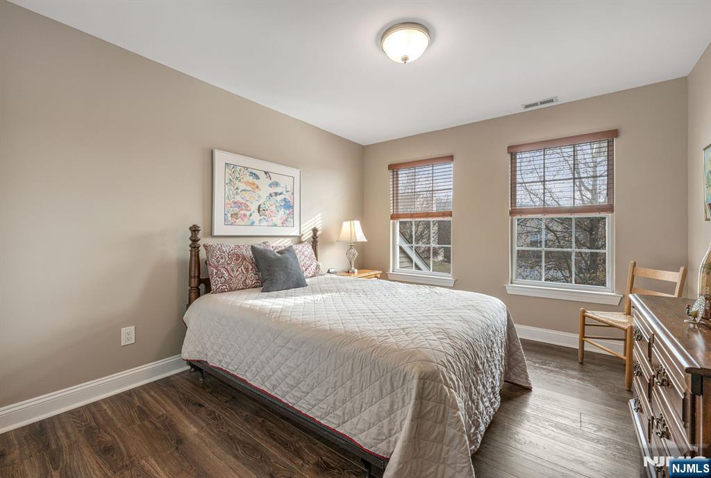 7 Winding Ridge Road Lake Hopatcong, NJ 07849 - Photo 32 of 48 a large bed sitting in a bedroom next to a window