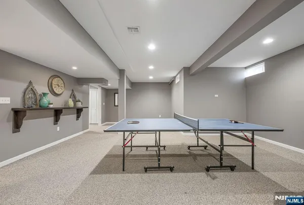 a living room with furniture and a table