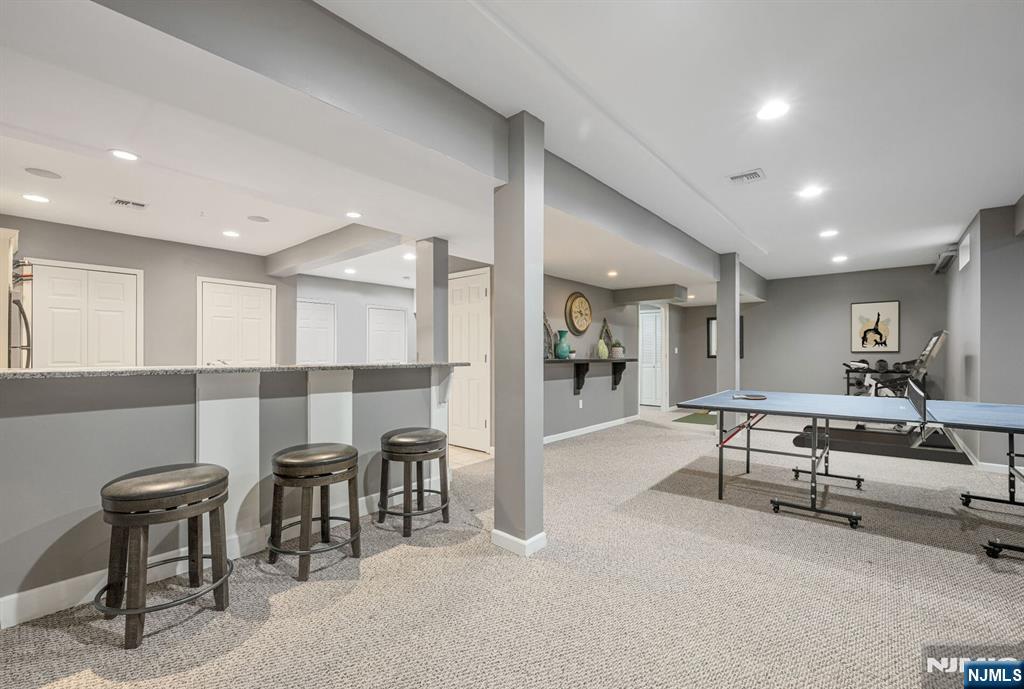 7 Winding Ridge Road Lake Hopatcong, NJ 07849 - Photo 40 of 48 a living room with furniture and a table