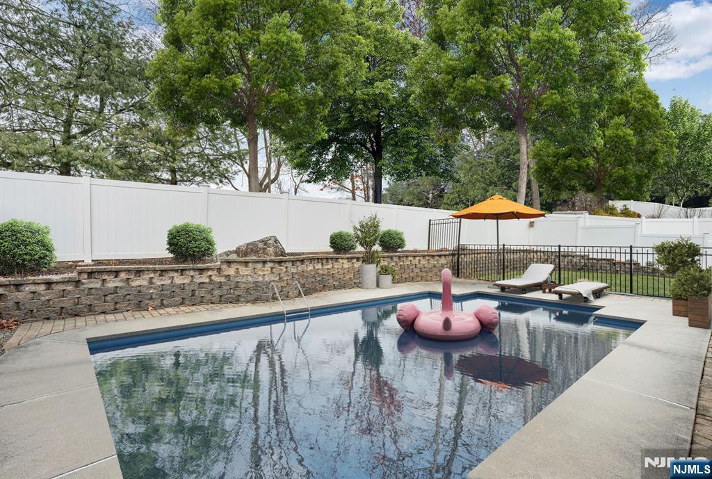 7 Winding Ridge Road Lake Hopatcong, NJ 07849 - Photo 46 of 48 a view of swimming pool with outdoor seating