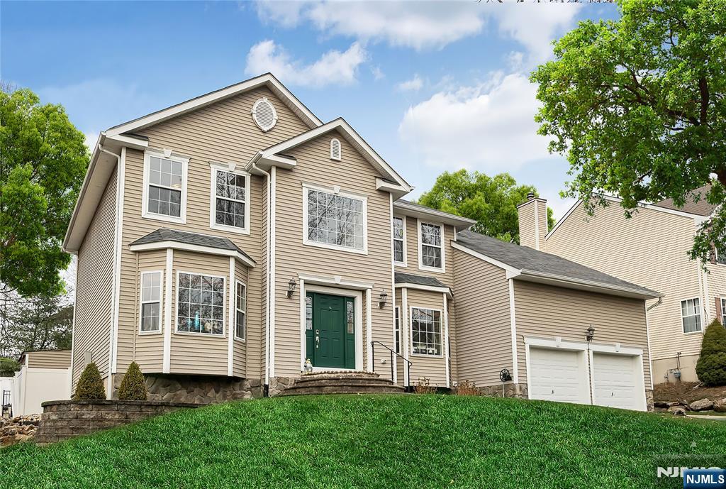 7 Winding Ridge Road Lake Hopatcong, NJ 07849 - Photo 48 of 48 a front view of a house with a yard