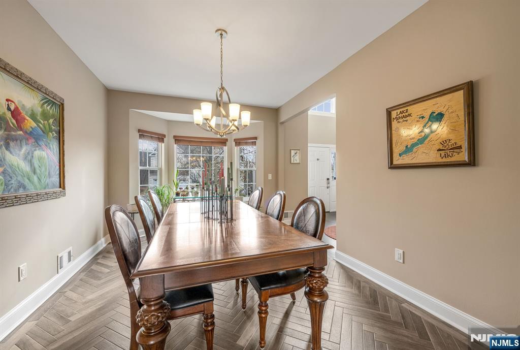 7 Winding Ridge Road Lake Hopatcong, NJ 07849 - Photo 7 of 48 a view of a dining room with furniture window and outside view