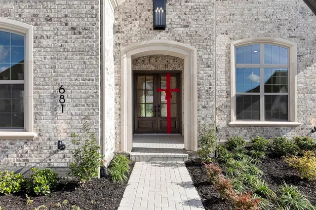 a front view of a house with a entrance