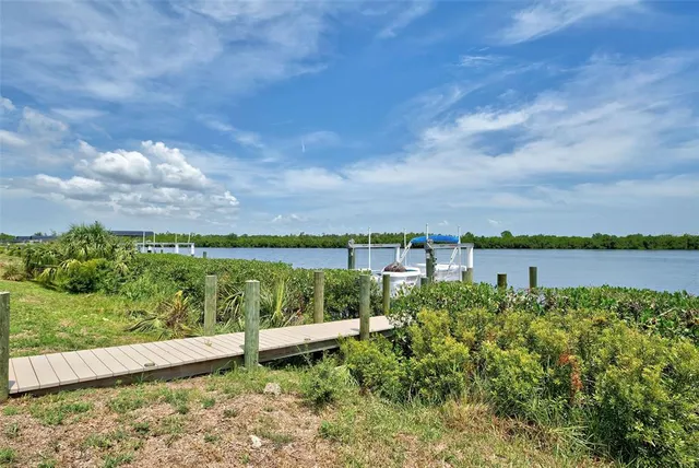 a view of a lake with a garden