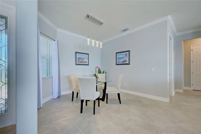 a view of a dining room with furniture