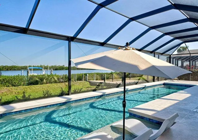 a view of yard with patio