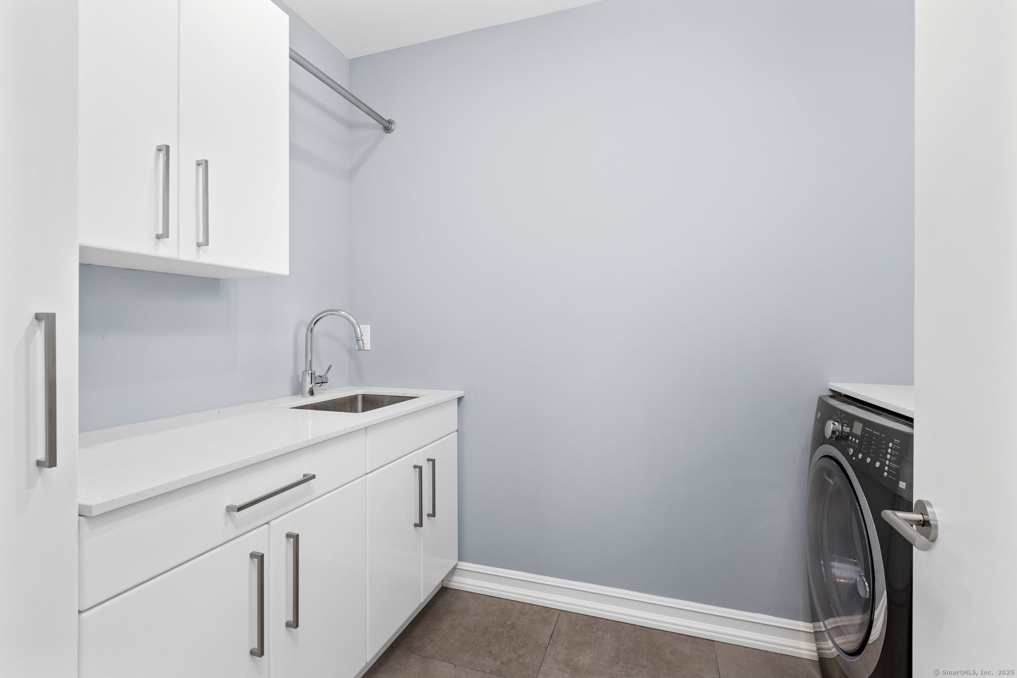 84 Olmstead Lane Ridgefield, CT 06877 - Photo 18 of 39 a utility room with dryer and washer