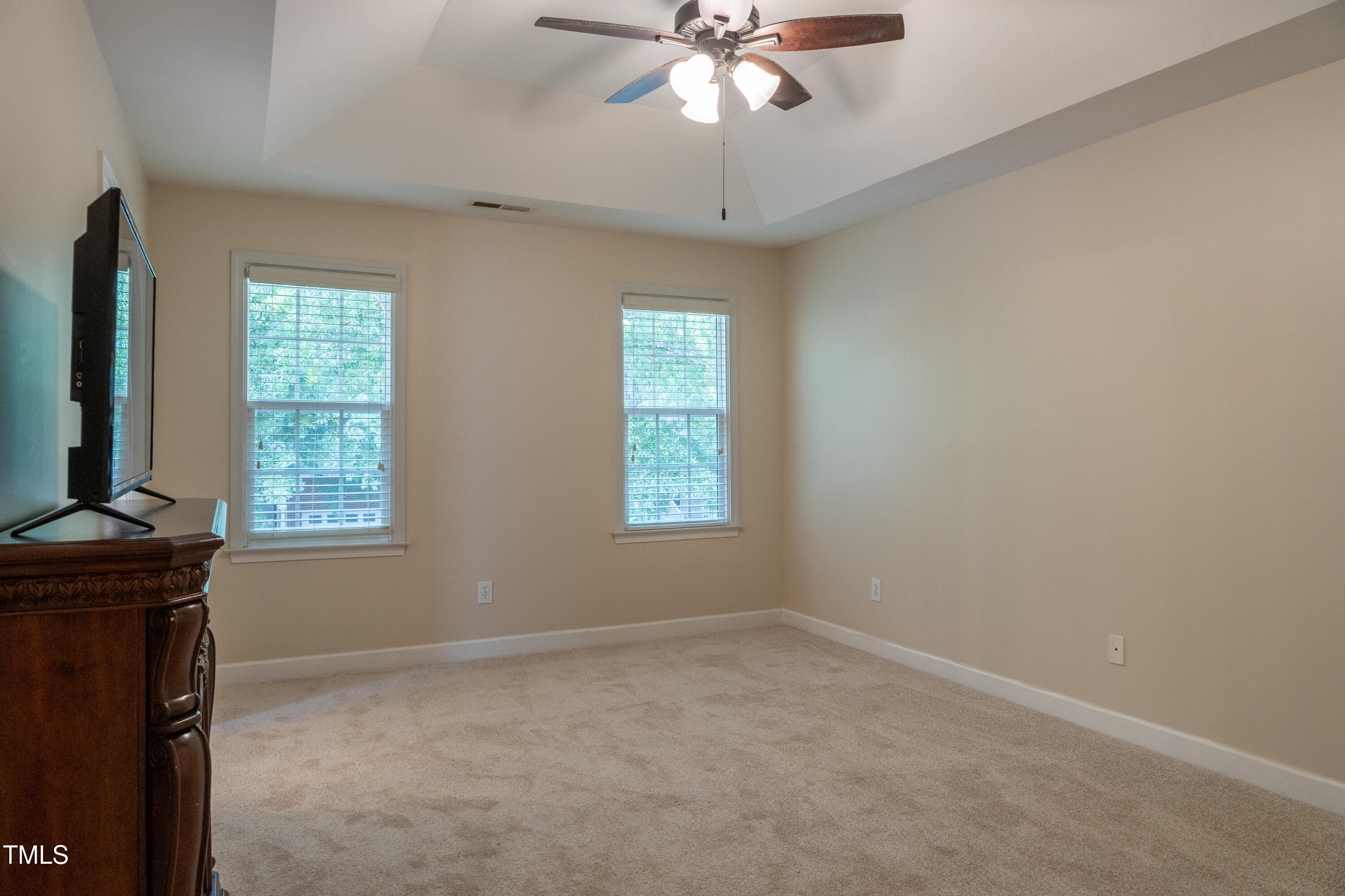 5944 Kohler Lane Raleigh, NC 27616 - Photo 13 of 26 a view of room with window and ceiling fan