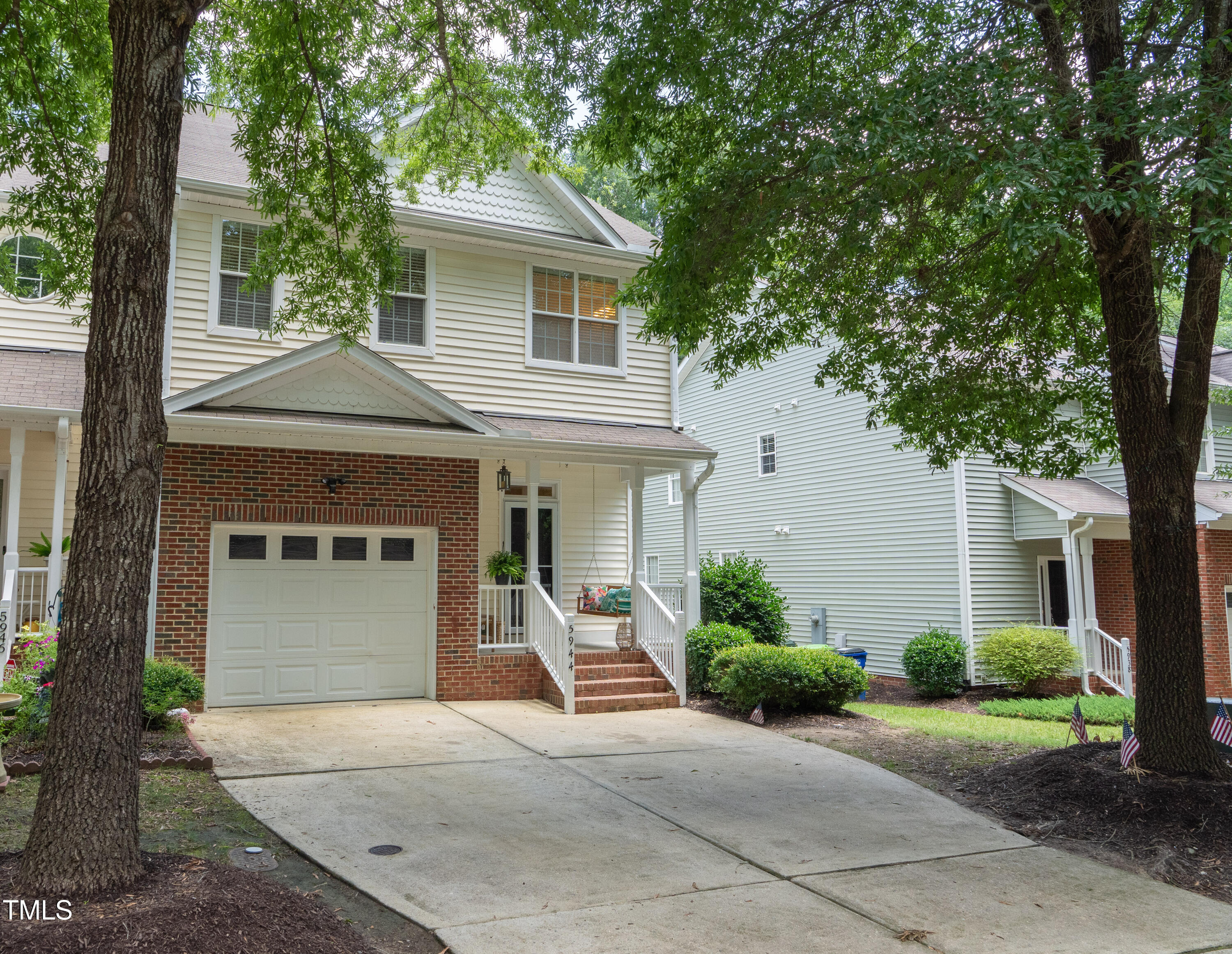 5944 Kohler Lane Raleigh, NC 27616 - Photo 2 of 26 a front view of a house with yard and trees