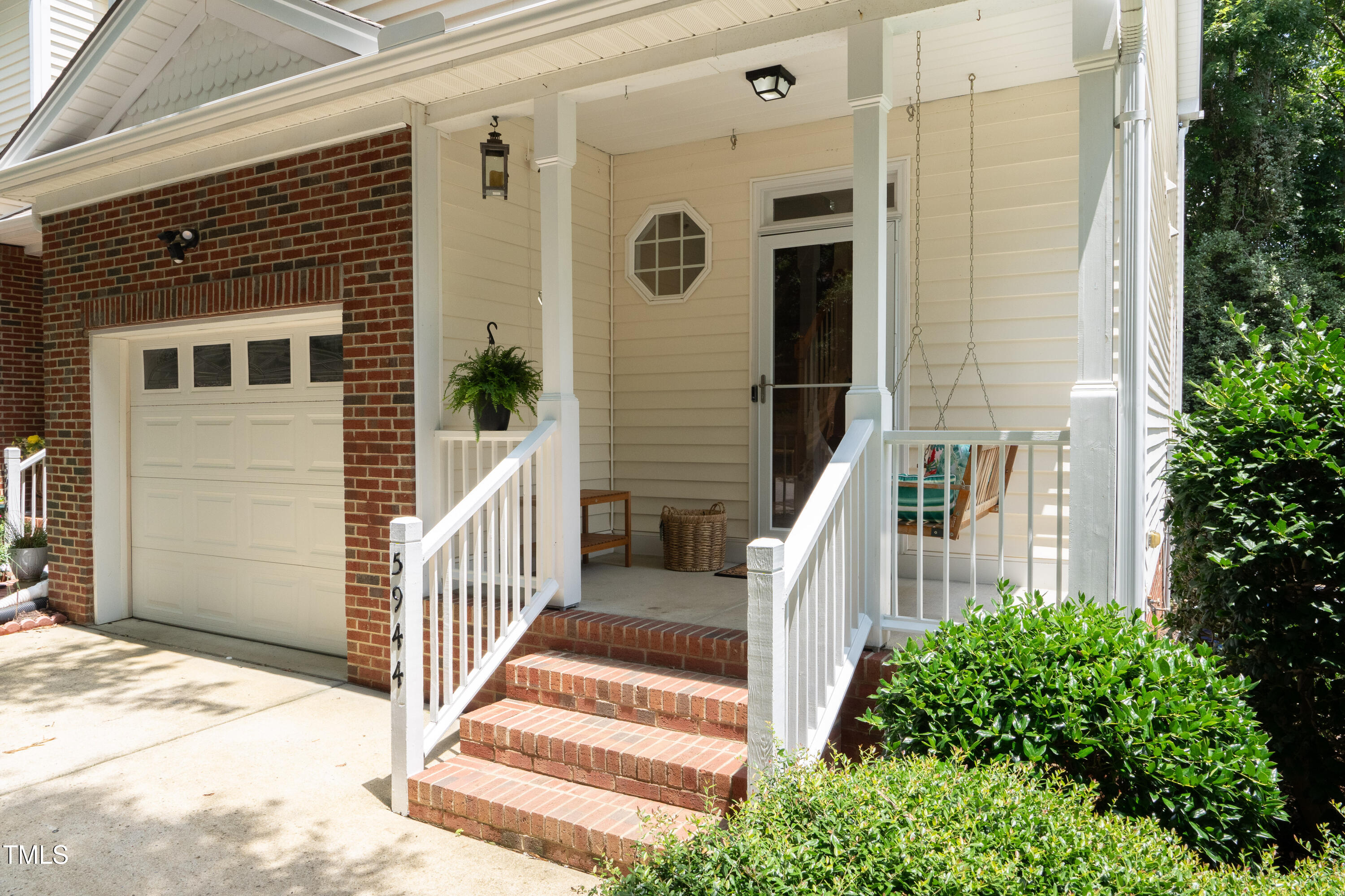 5944 Kohler Lane Raleigh, NC 27616 - Photo 4 of 26 a front view of a house with a yard