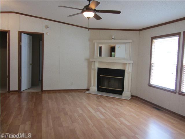 1901 Martin Farm Road Madison, NC 27025 - Photo 13 of 16 Den/Family/Great Room. Den with fireplace