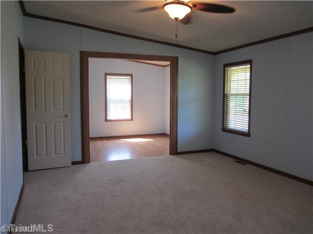 1901 Martin Farm Road Madison, NC 27025 - Photo 9 of 16 Master Bedroom. Master Bedroom with office/nursery