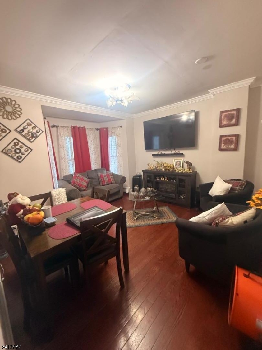 5 Dewey Street Dover, NJ 07801 - Photo 15 of 18 a living room with furniture a flat screen tv and a window