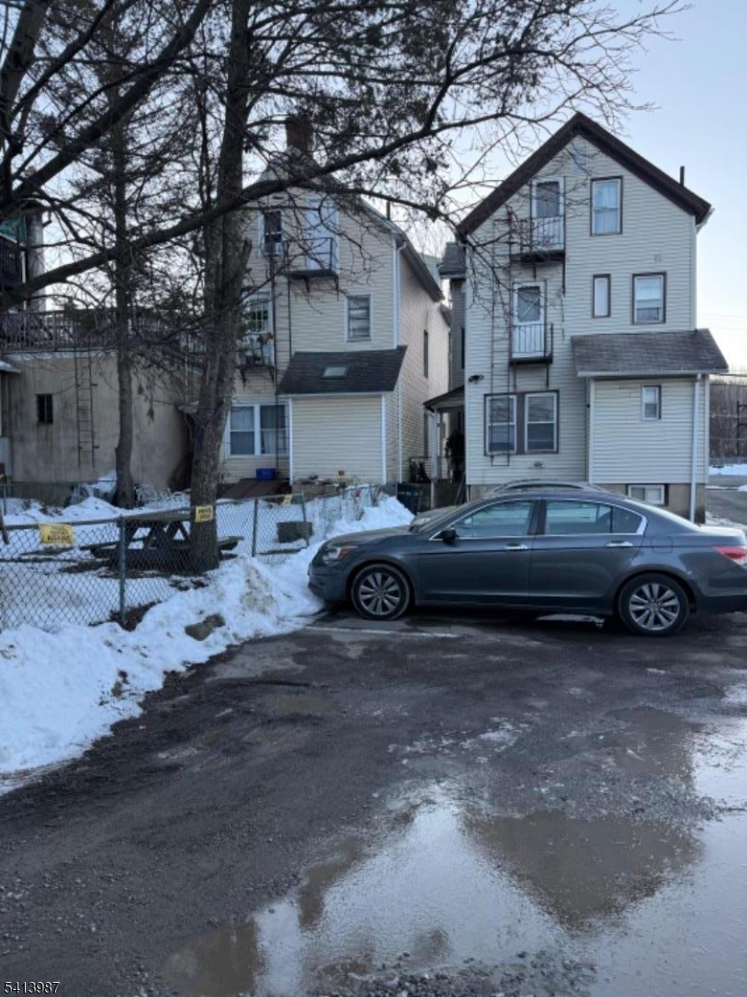 5 Dewey Street Dover, NJ 07801 - Photo 2 of 18 a view of a car parked in front of house