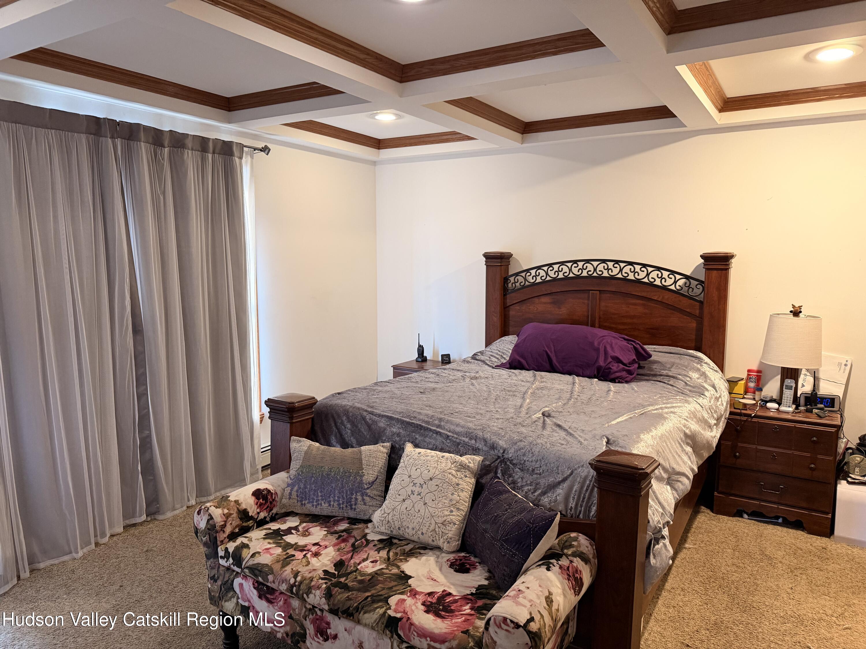 4952 Highway 32 Catskill, NY 12414 - Photo 18 of 19 a bedroom with a bed and a window