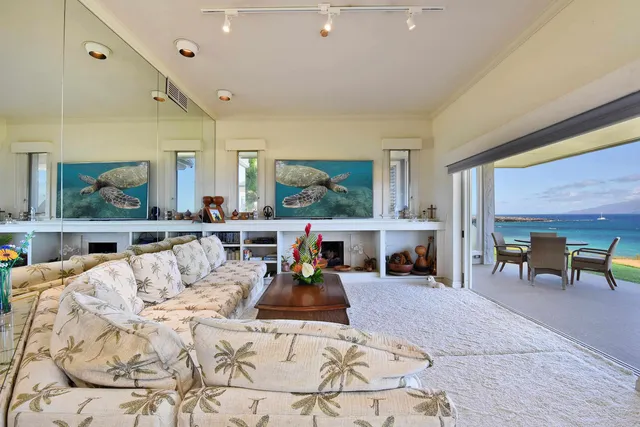 a view of an ocean and a yard