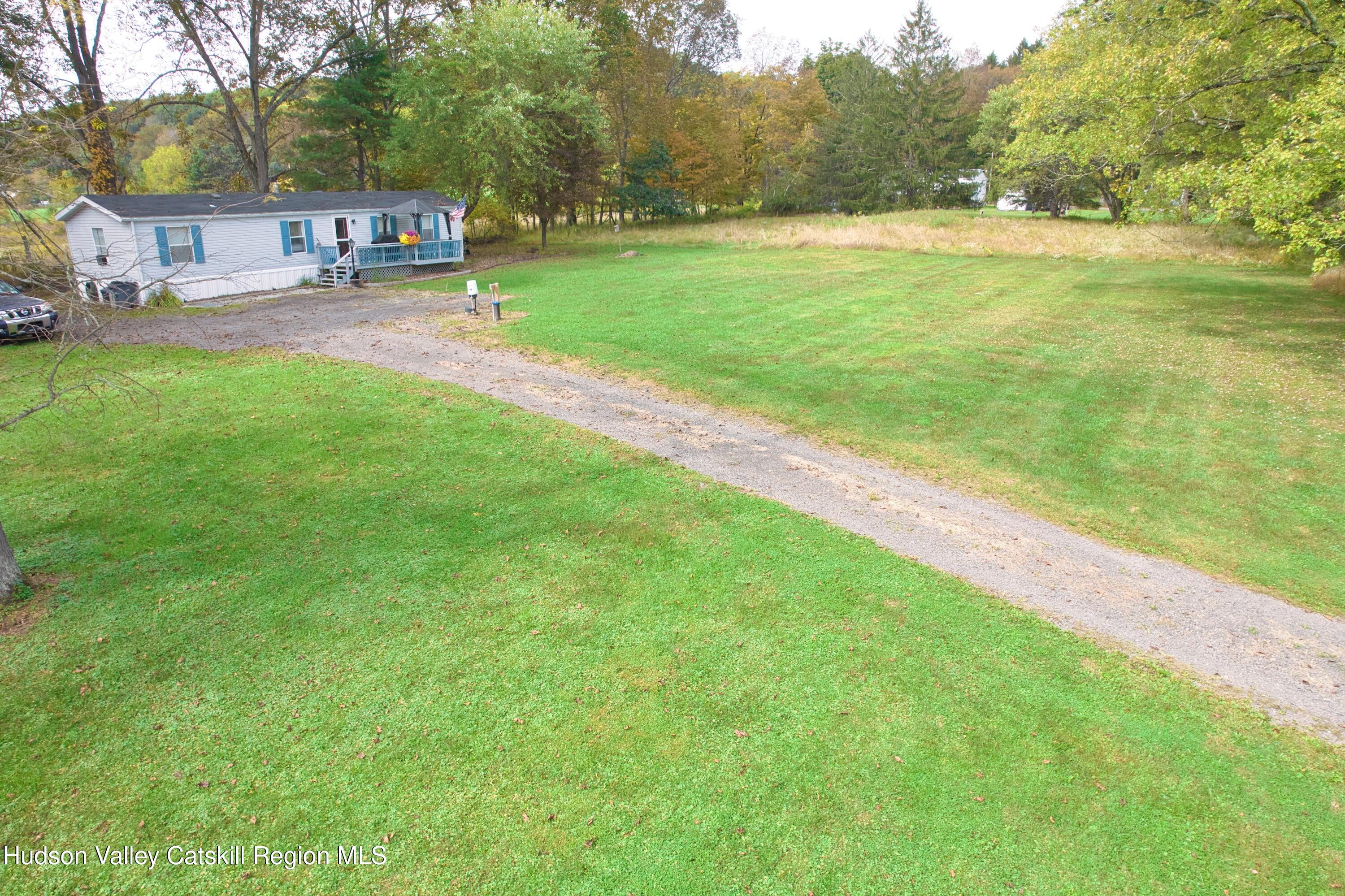 315 Pine Bush Road Stone Ridge, NY 12484 - Photo 13 of 30 a view of a swimming pool with a yard