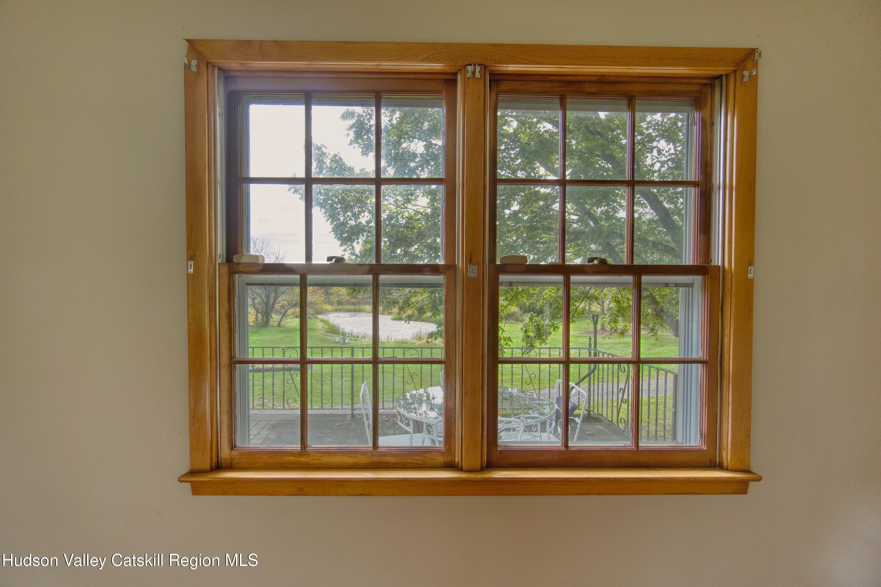 315 Pine Bush Road Stone Ridge, NY 12484 - Photo 18 of 30 a view of a glass door and a window