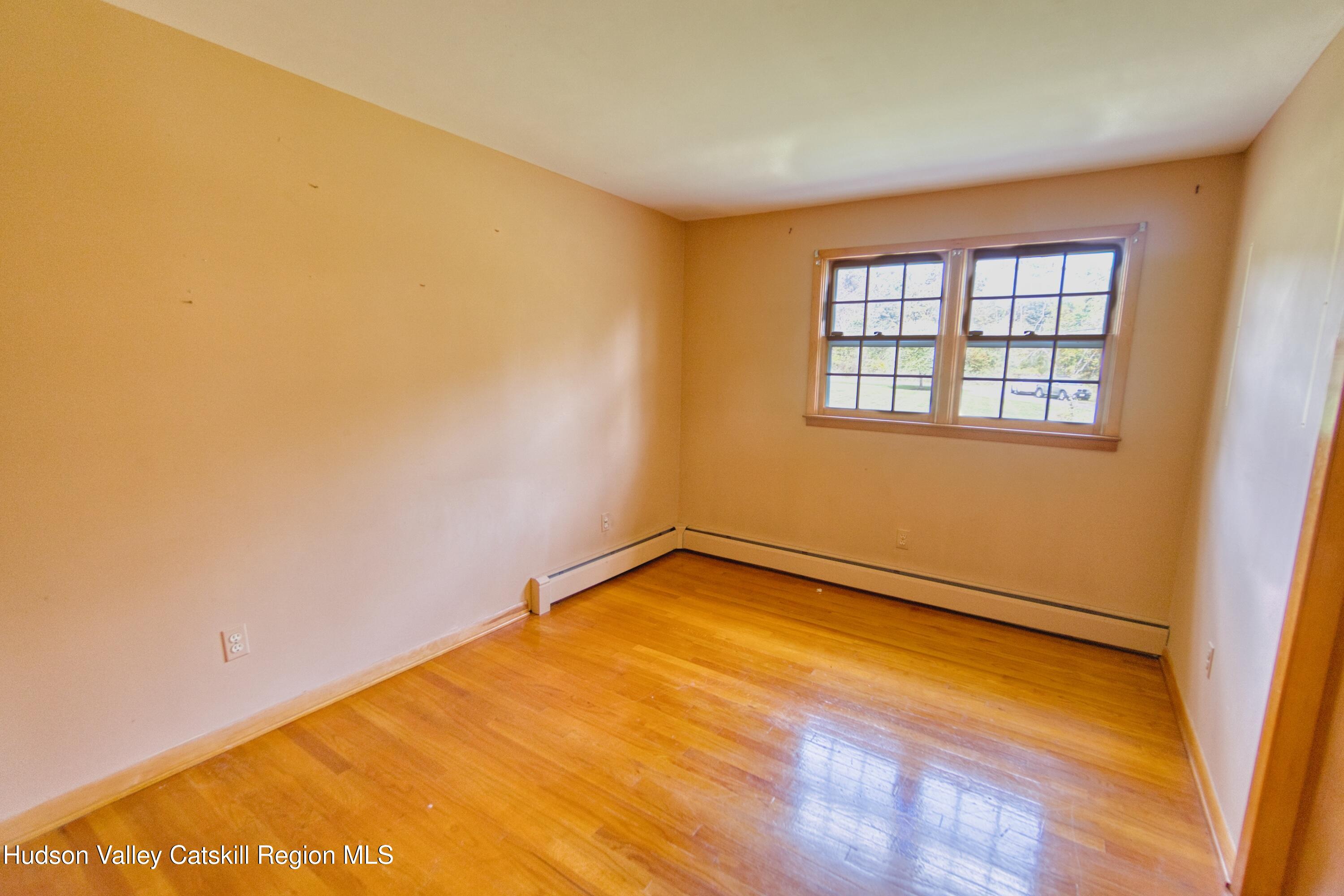 315 Pine Bush Road Stone Ridge, NY 12484 - Photo 23 of 30 a view of an empty room with a window
