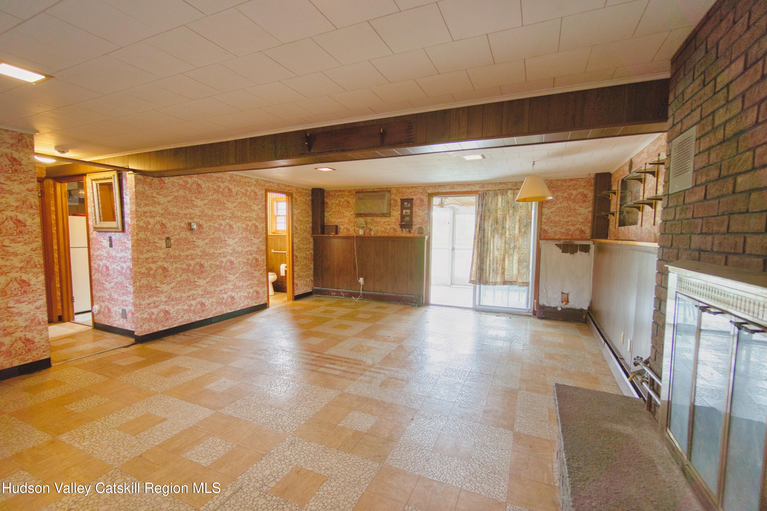 315 Pine Bush Road Stone Ridge, NY 12484 - Photo 25 of 30 a view of a hallway with an empty room