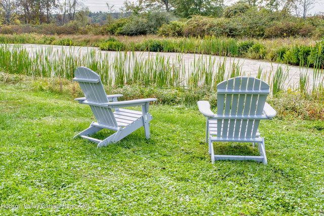 a view of a garden with a lake