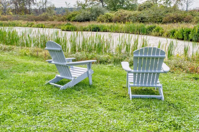 a view of a garden with a lake