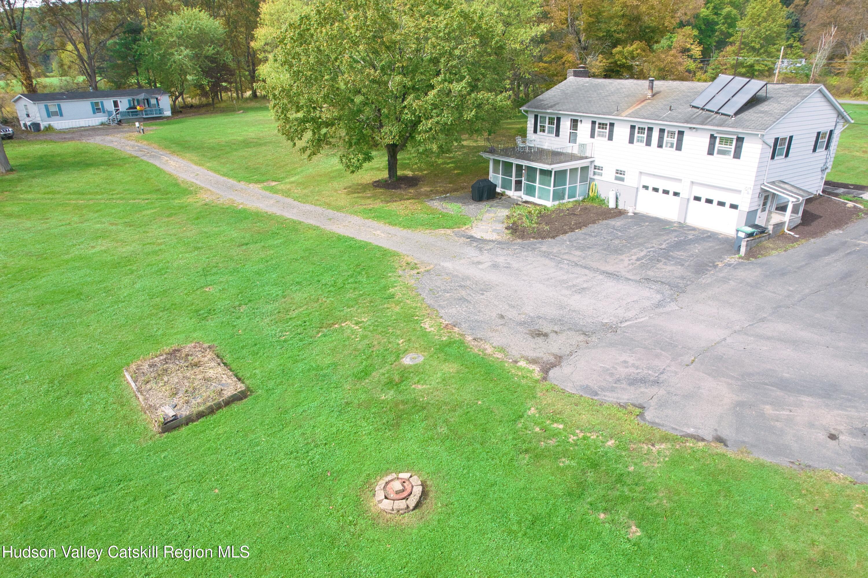 315 Pine Bush Road Stone Ridge, NY 12484 - Photo 7 of 30 a view of a house with a yard