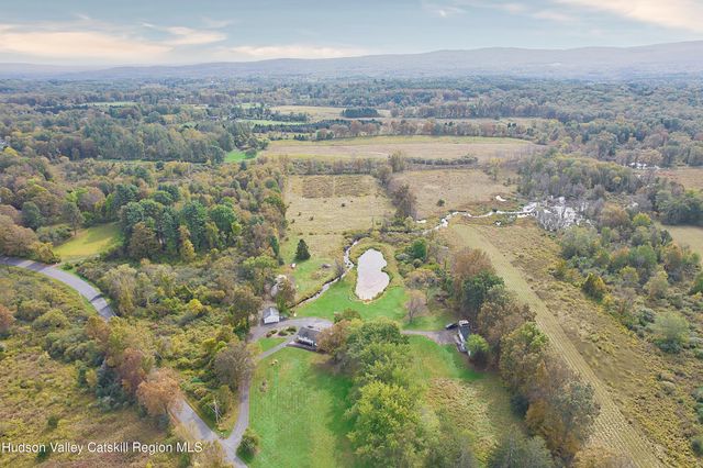 a view of a back yard from a balcony