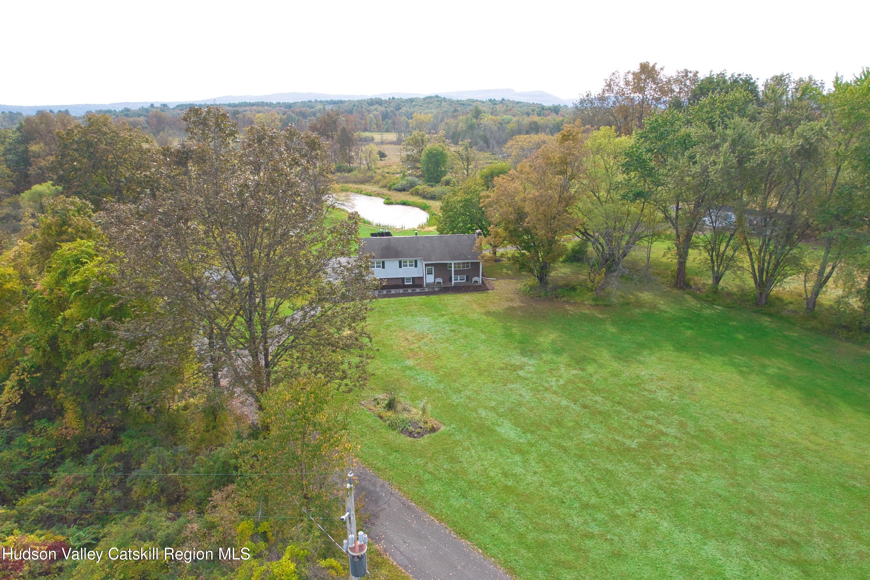 315 Pine Bush Road Stone Ridge, NY 12484 - Photo 9 of 30 a view of a back yard from a balcony