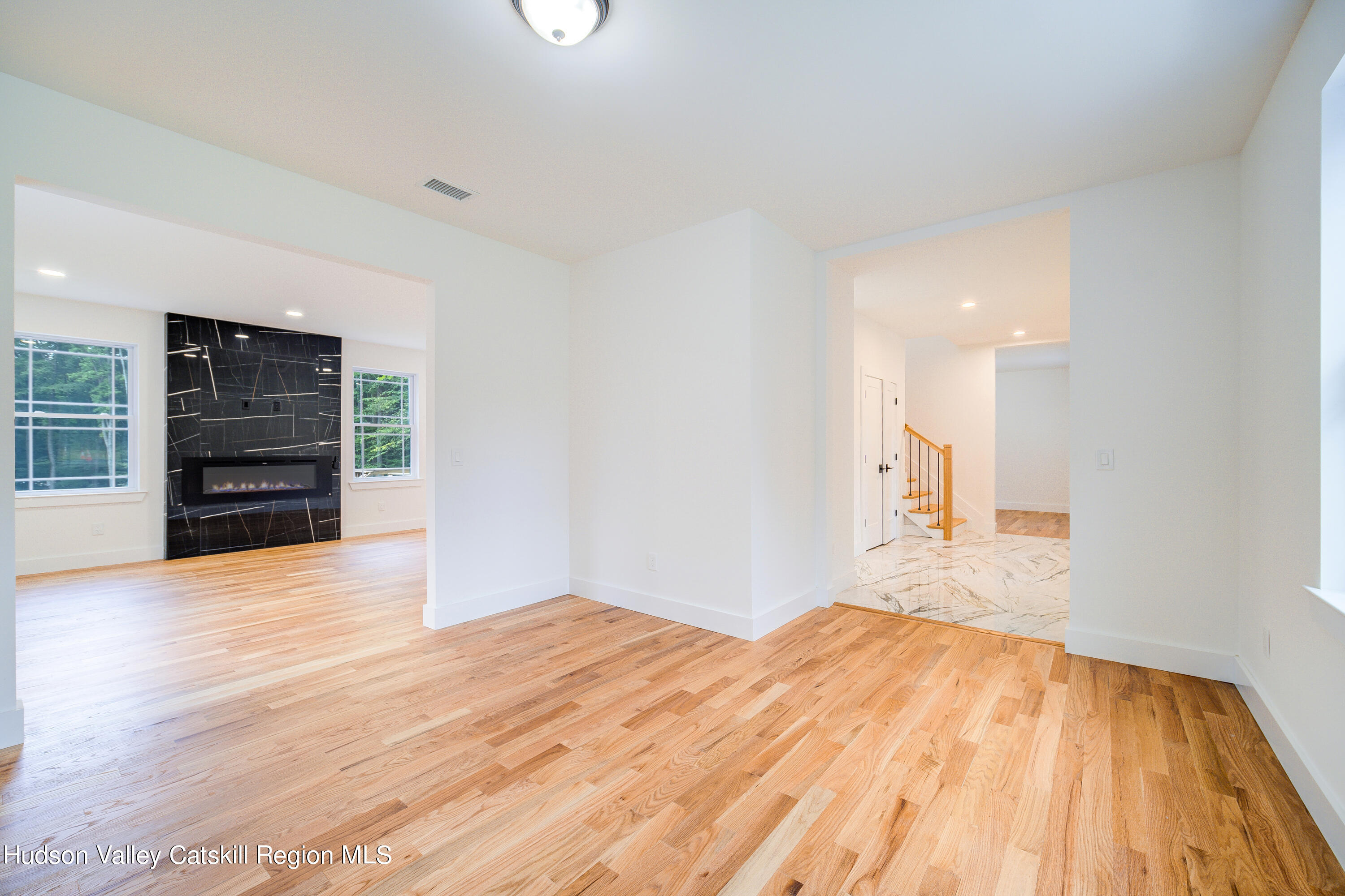 3 Calico Way, Unit WAYS Wallkill, NY 12589 - Photo 13 of 68 a view of empty room with wooden floor