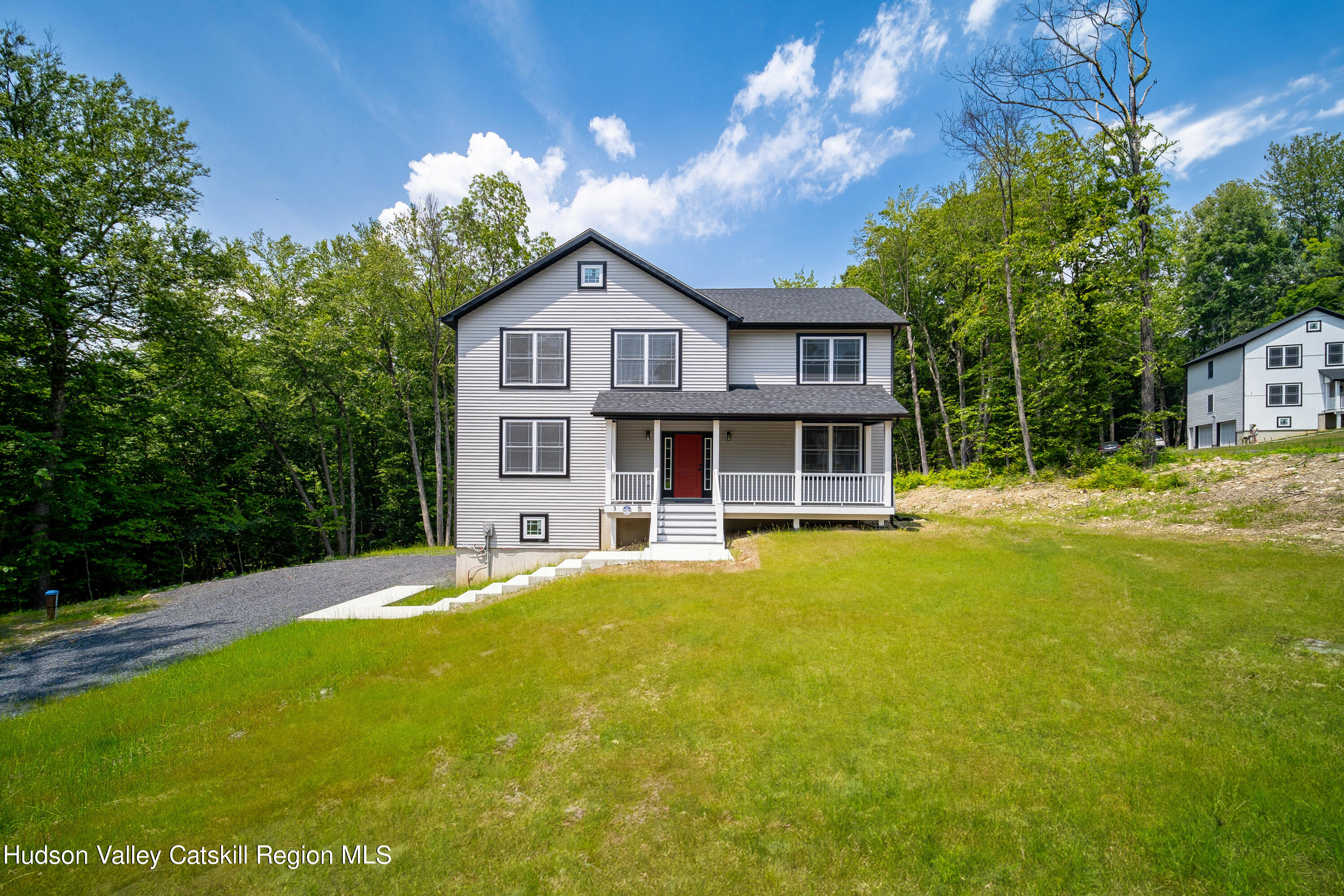 3 Calico Way, Unit WAYS Wallkill, NY 12589 - Photo 2 of 68 a front view of a house with a yard