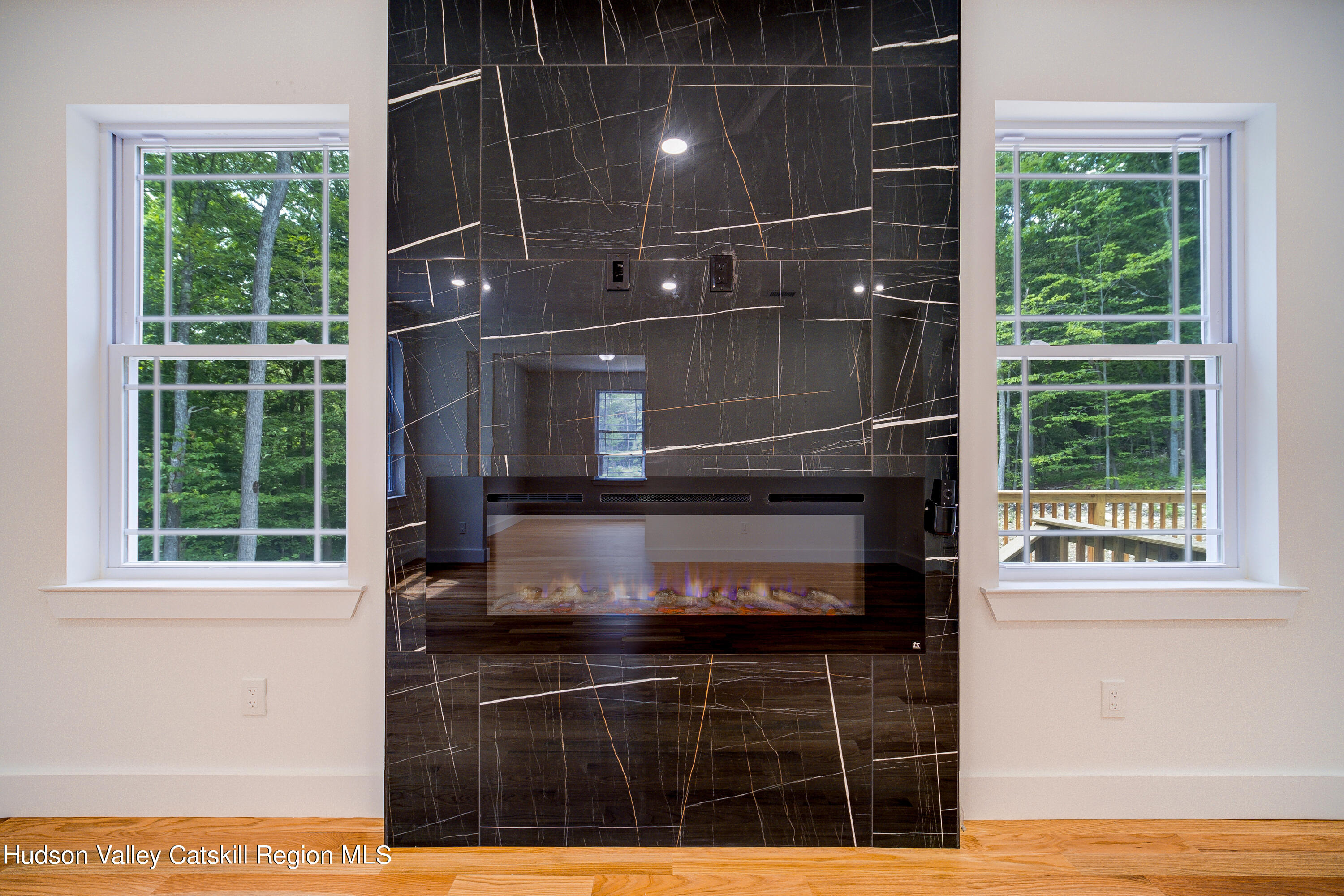 3 Calico Way, Unit WAYS Wallkill, NY 12589 - Photo 22 of 68 a room with wooden floor and a fireplace