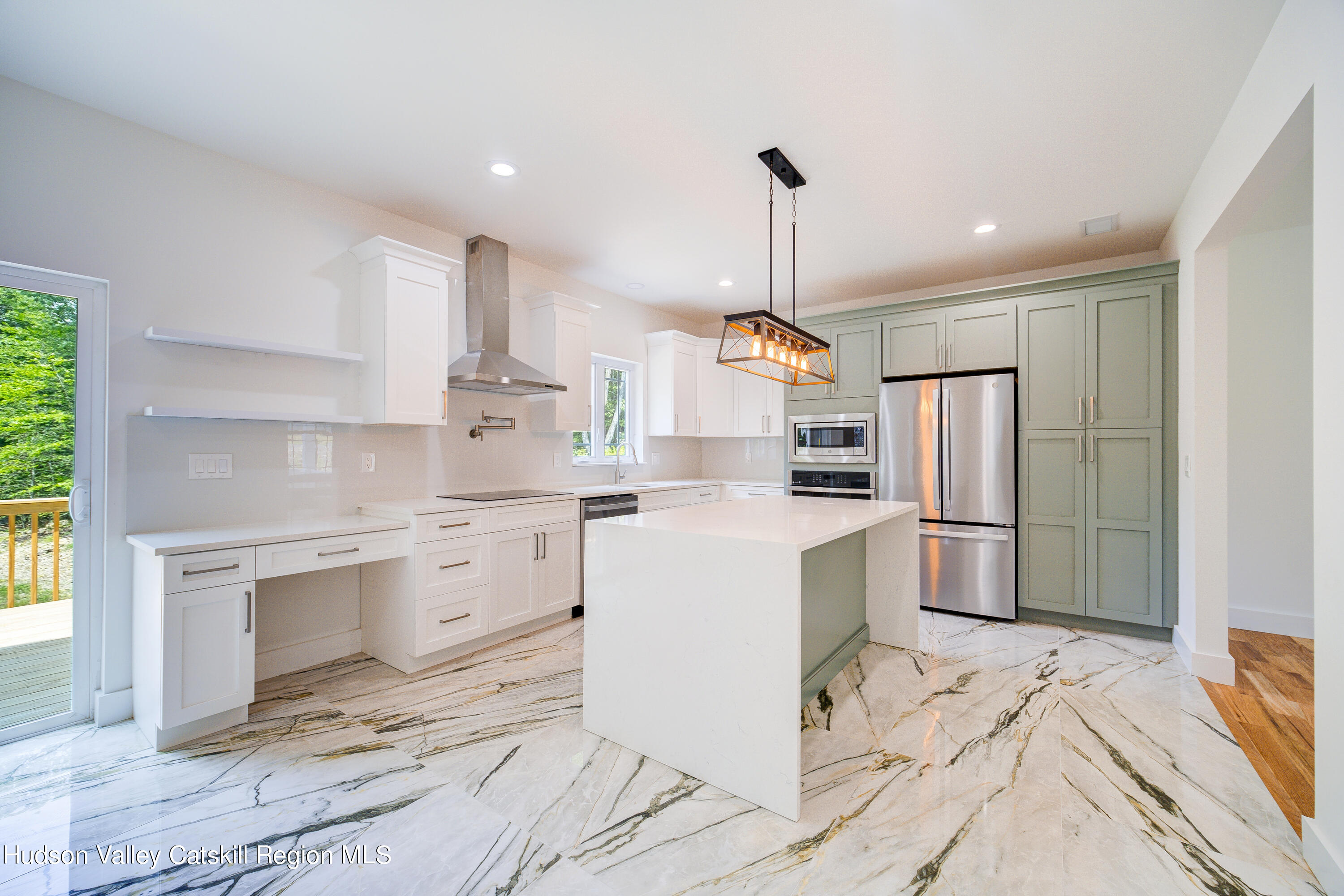 3 Calico Way, Unit WAYS Wallkill, NY 12589 - Photo 26 of 68 a kitchen with a sink stainless steel appliances and white cabinets
