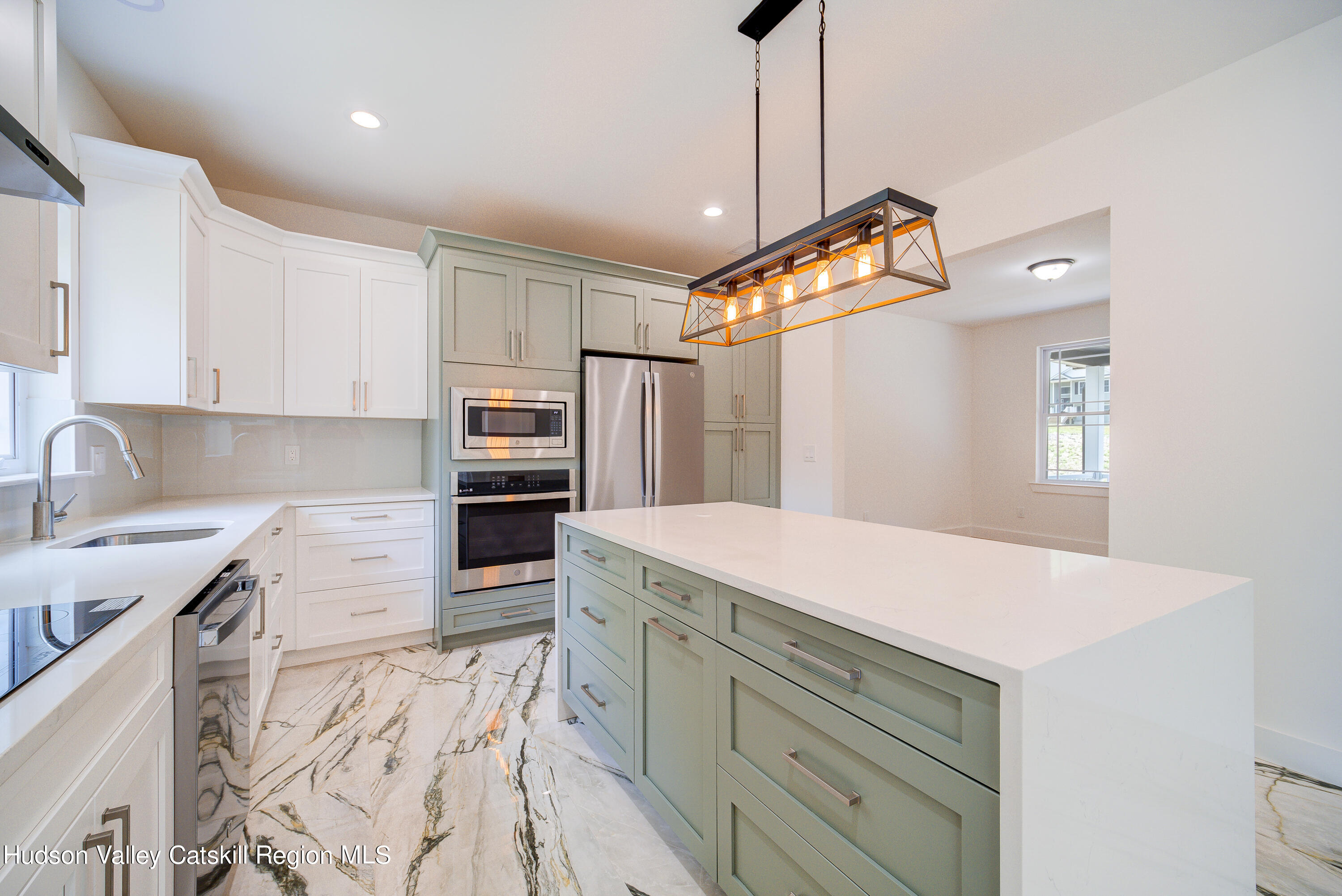 3 Calico Way, Unit WAYS Wallkill, NY 12589 - Photo 28 of 68 a kitchen with a refrigerator and a sink