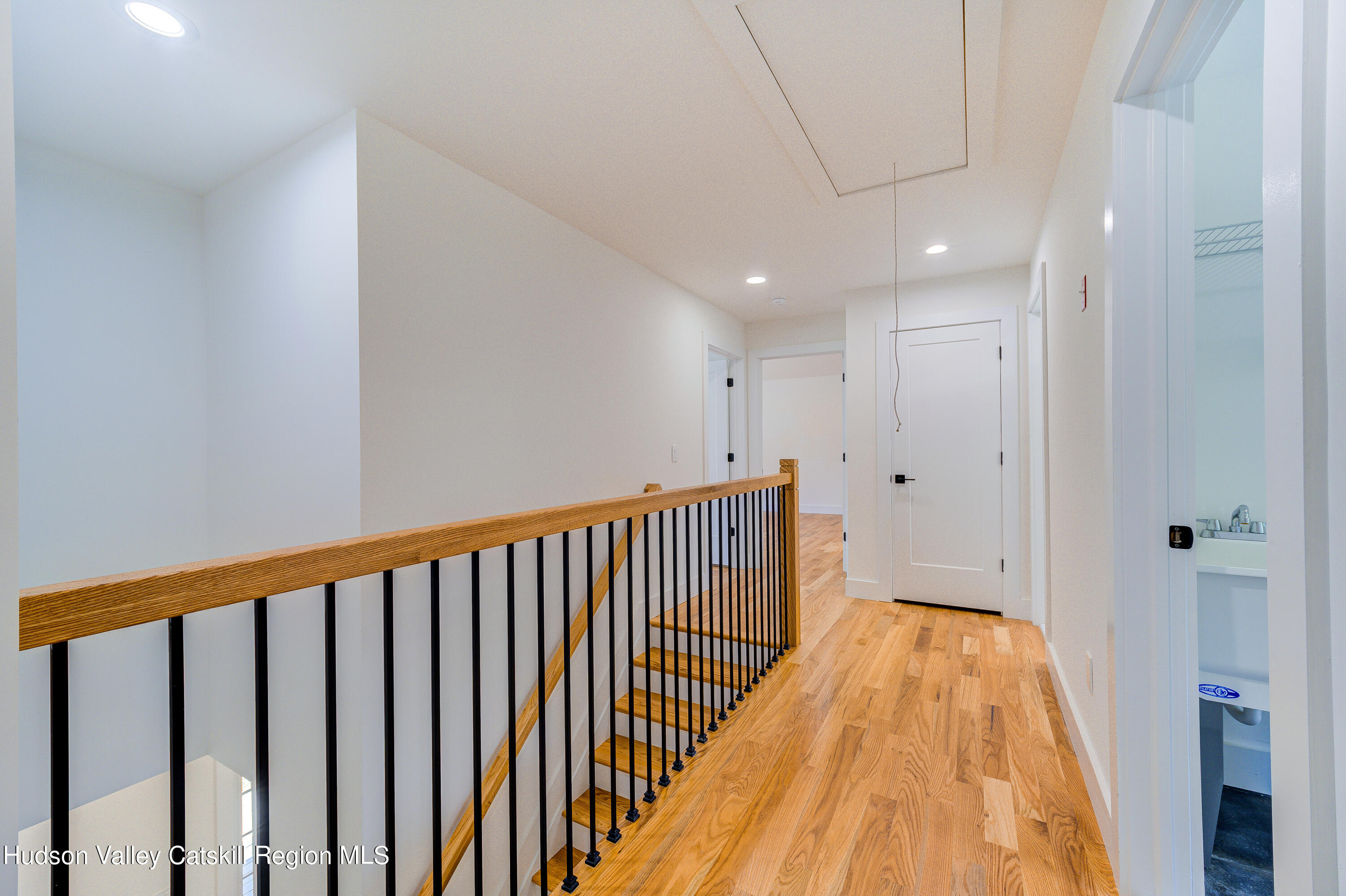 3 Calico Way, Unit WAYS Wallkill, NY 12589 - Photo 43 of 68 a view of a hallway with wooden floor