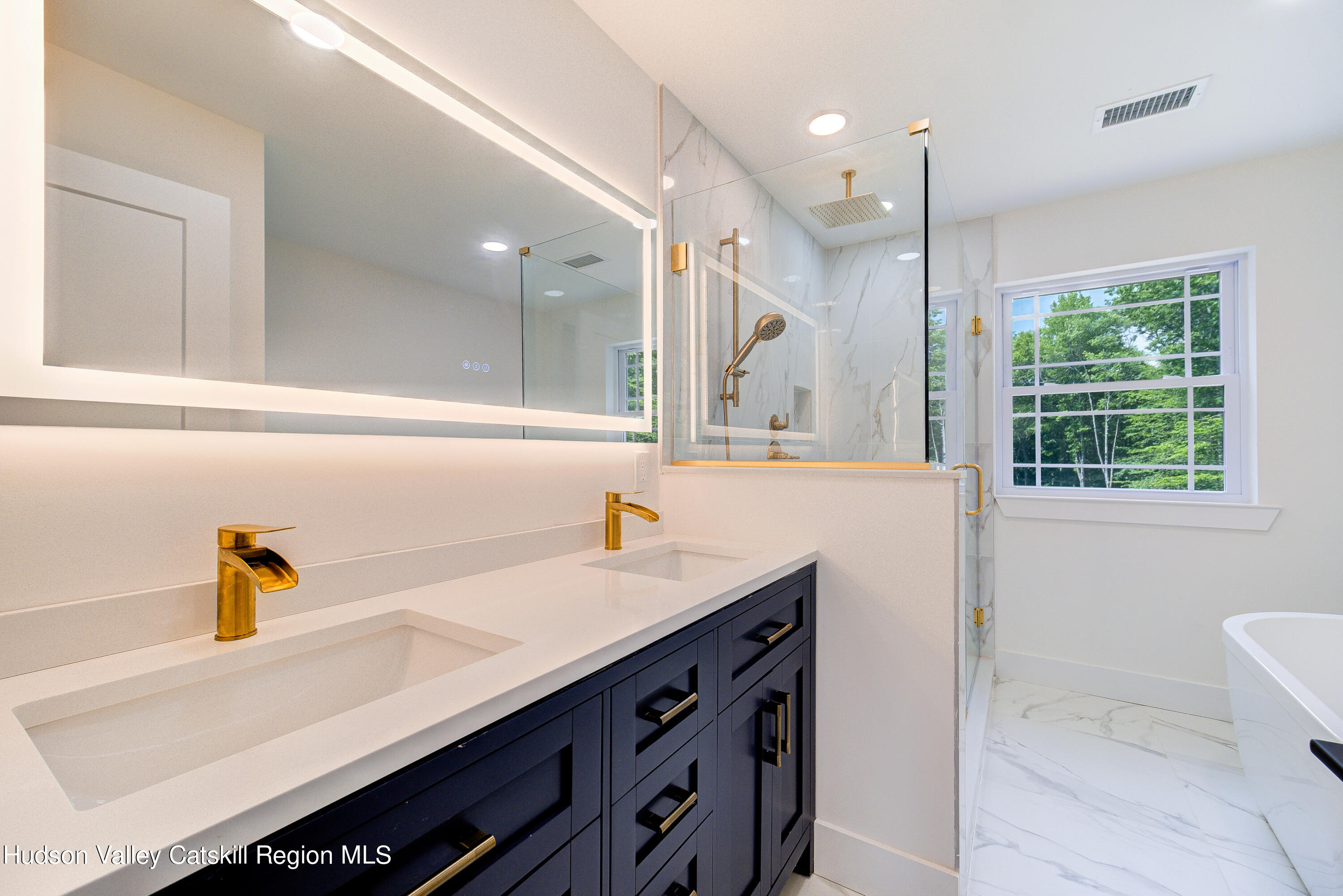 3 Calico Way, Unit WAYS Wallkill, NY 12589 - Photo 51 of 68 a bathroom with a sink and a mirror